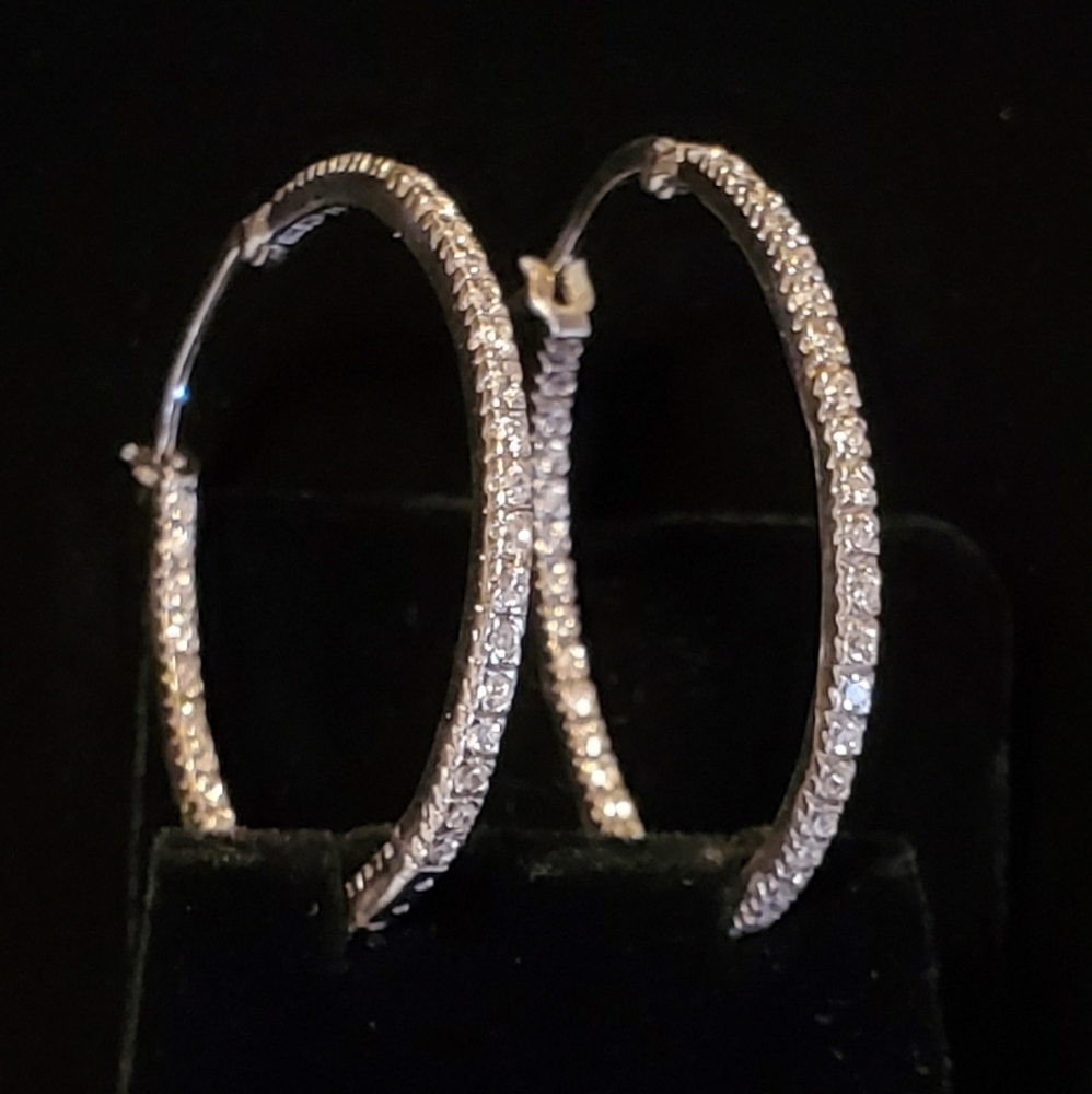 Beautiful silver tone and faux diamond hoops